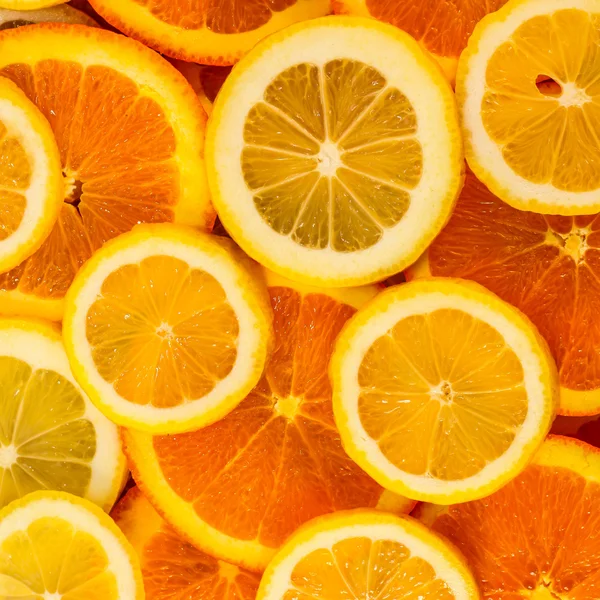 Zdravé čerstvé potraviny pozadí. citron a pomeranč. — Stock fotografie