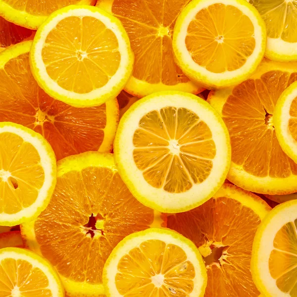 Zdravé čerstvé potraviny pozadí. citron a pomeranč. — Stock fotografie