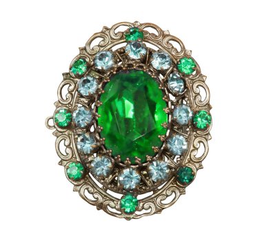 Vintage brooch with emeralds  isolated on a white background clipart