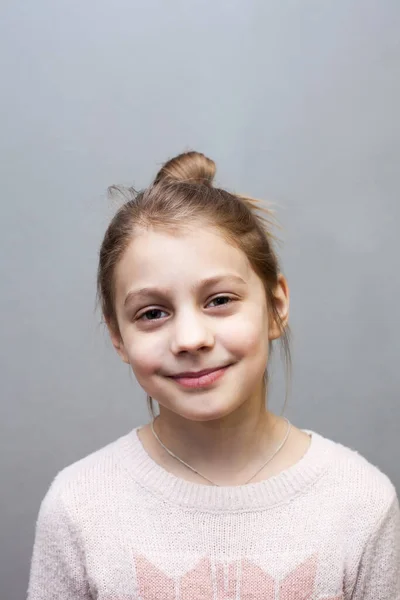 Smiling Girl Pre Teen Age Grey Background — Stockfoto