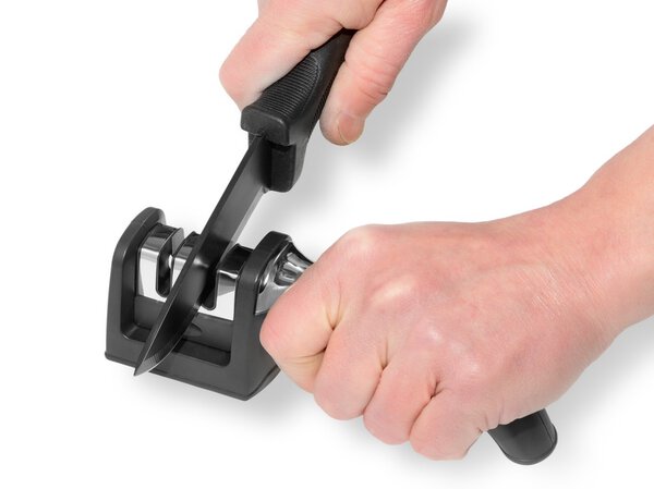 Sharpening knife on white background
