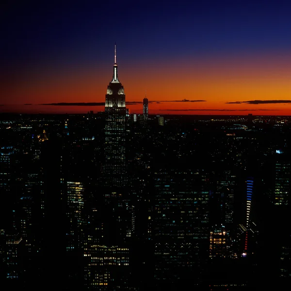 Zonsondergang boven een New York City. — Stockfoto