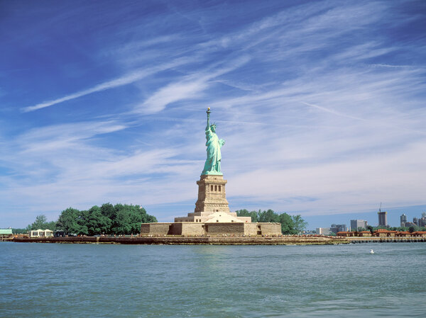 Statue of Liberty at sunny day.