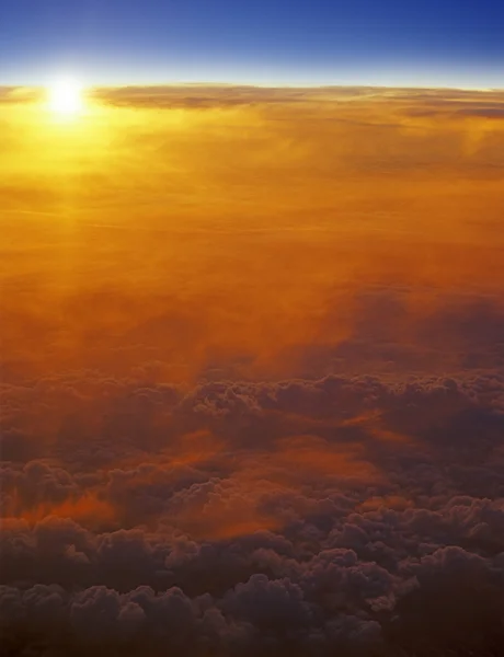 Sunset over a clouds. — Stock Photo, Image
