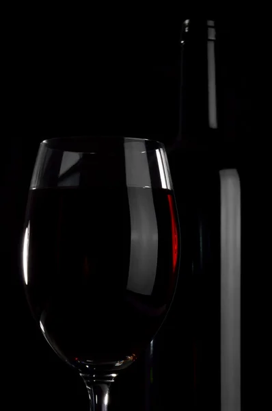 Bottle and wineglass. — Stock Photo, Image