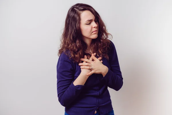 Una mujer con un ataque al corazón —  Fotos de Stock