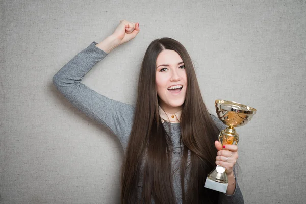 Woman winning a trophy — Stock Photo, Image