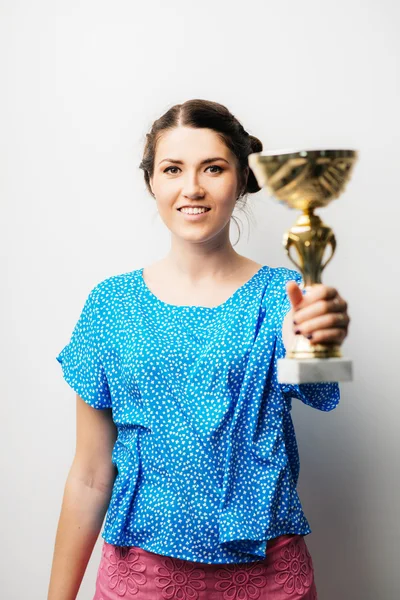 Woman holding a prize cup — Stock Photo, Image