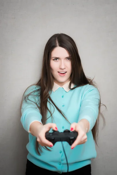 Meisje spelen videogame — Stockfoto