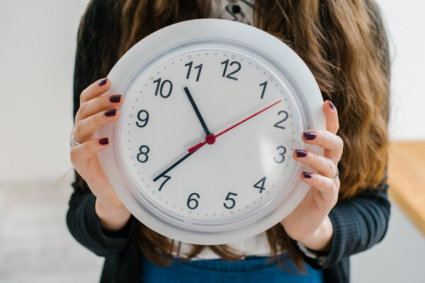 Large Clock In Hands