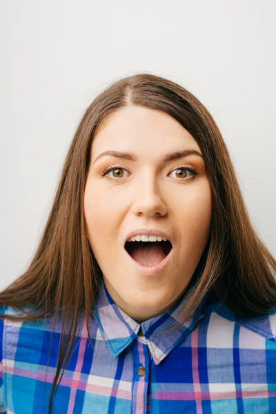 Woman looking pleasantly surprised — Stock Photo, Image
