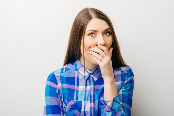 Woman  covering her mouth with hand — Stock Photo, Image