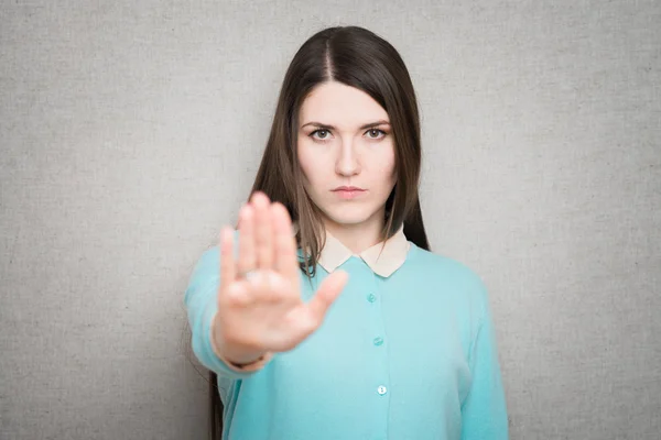 Kobieta pokazano przystanek gest — Zdjęcie stockowe