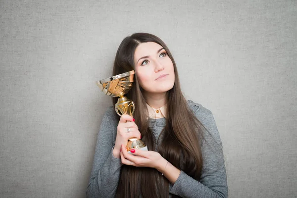 Woman winning a trophy — Stock Photo, Image