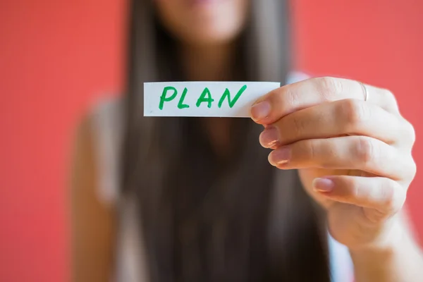 Planerar att ordet på bit papper — Stockfoto