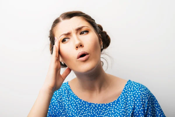 Young woman has a headache — Stock Photo, Image