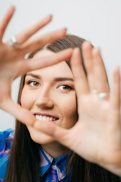 Woman making a heart gesture — Stock Photo, Image