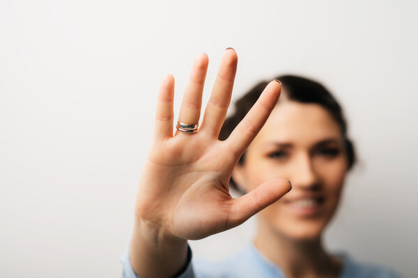 girl showing stop gesture 