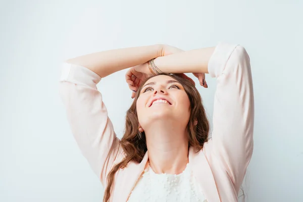 Young woman stretches — Stock Photo, Image