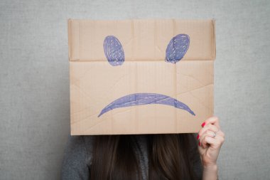 Woman with sad smiley on face clipart