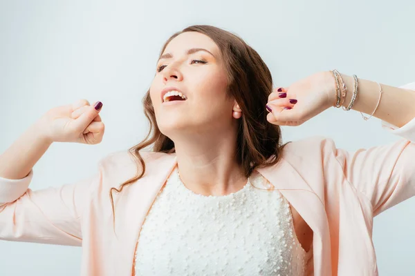 Woman stretches and yawns — Stock Photo, Image