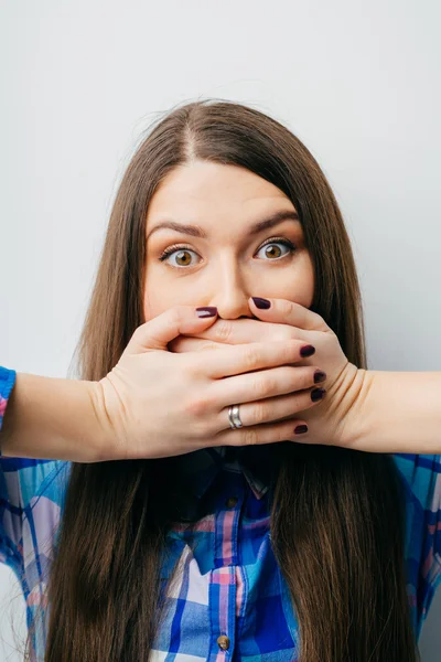 Woman with hands on  mouth — Stock Photo, Image
