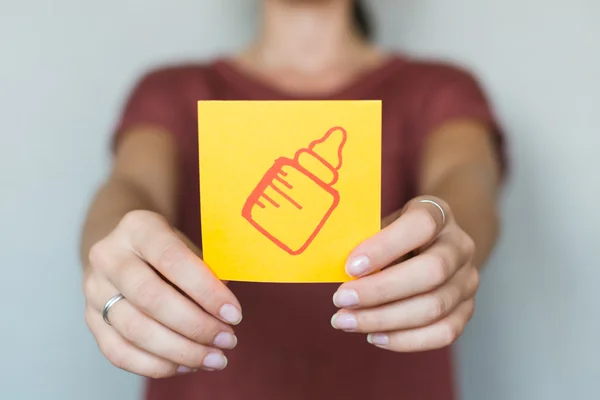 Bebé botella de leche icono en papel —  Fotos de Stock