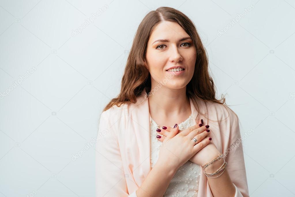 Girl puts her hands on chest Stock Photo by ©file404 113969782
