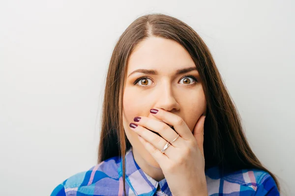 Woman  covering her mouth with hand — Stock Photo, Image