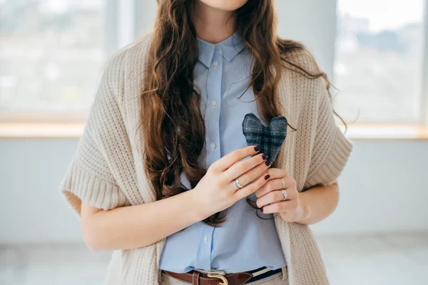 Toy heart in hands — Stock Photo, Image