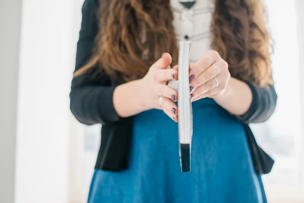 Magazine in female hands — Stock Photo, Image