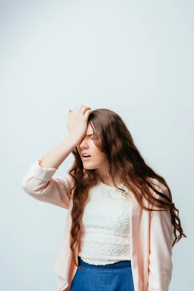 Young girl in chagrin — Stock Photo, Image