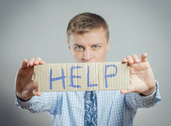 Man holding help text — Stock Photo, Image