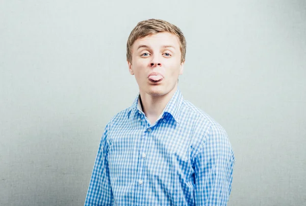 Man shows tongue — Stock Photo, Image