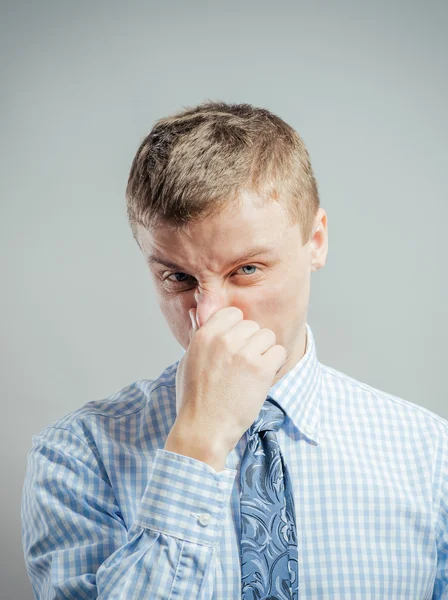 Man squeeze his nose — Stock Photo, Image