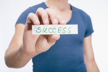 Eldeki başarı kelimesi