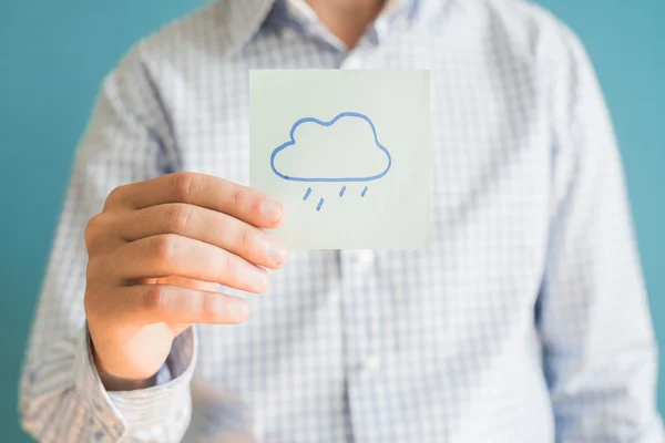 Ícone de chuva no papel — Fotografia de Stock