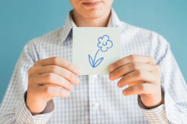 Ícone de flor no papel — Fotografia de Stock