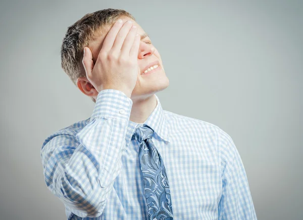 Man with hand on his head — Stock Photo, Image