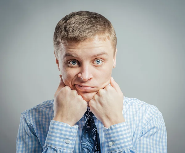 Man with hands on the chin — Stock Photo, Image