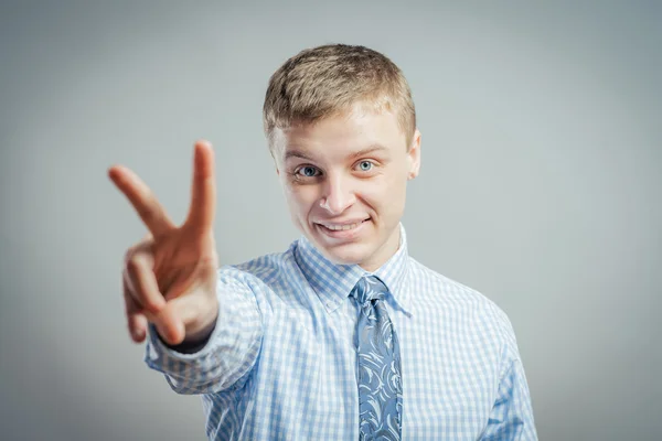 Man showing the victory sign — Stock Photo, Image