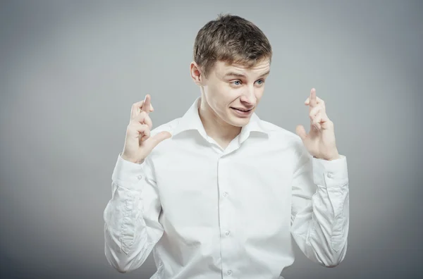 Man crossed his fingers — Stock Photo, Image