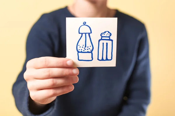 Salt and pepper sing on paper — Stock Photo, Image