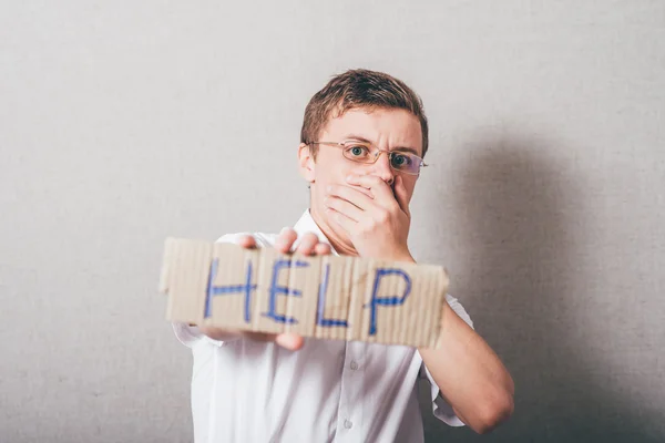 Hombre sosteniendo ayuda palabra — Foto de Stock