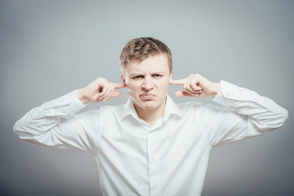 Man clasped his ears — Stock Photo, Image