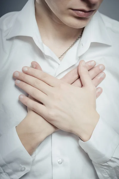 Man with hands on heart — Stock Photo, Image