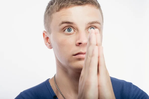 Young man praying — Stock Photo, Image