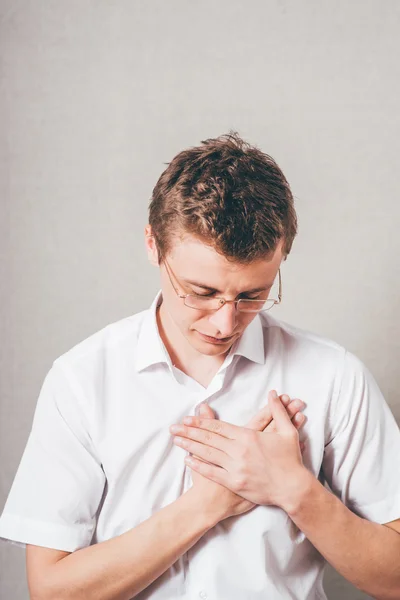 Man with hand on his chest — Stock Photo, Image