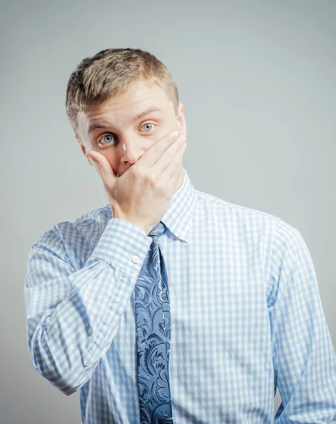 Man keep his mouth closed by hand — Stock Photo, Image