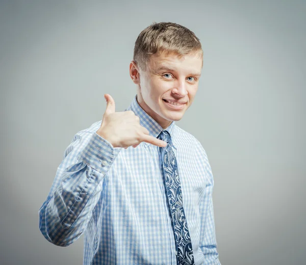 Man showing call me sign — Stock Photo, Image